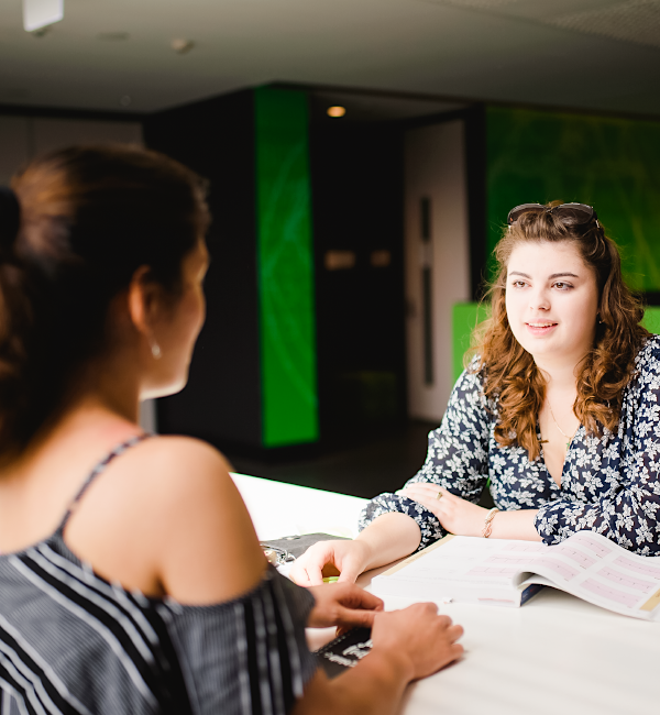 staff and student discuss career options