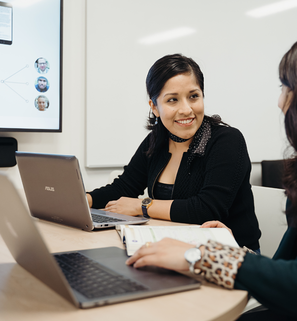Staff using a laptop