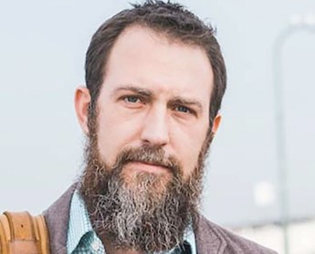  Associate Professor Matthew Crawford a white man with beard